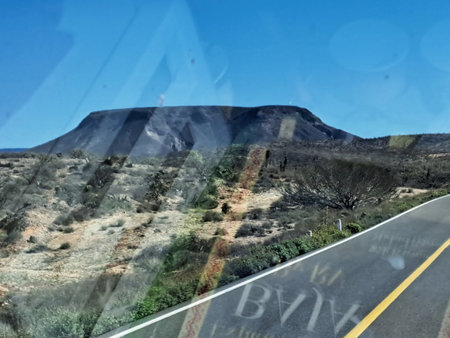 Road through the hills of the Mojave Desert, California, USAの写真素材