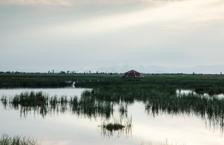 Beautiful sunset at the lakeの写真素材