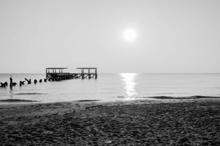 black & white Fishing pier Sunriseの写真素材