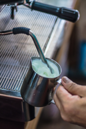 Barista making a cup of coffeeの写真素材