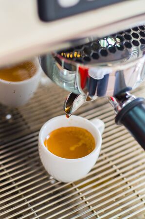 Barista making a cup of coffeeの写真素材