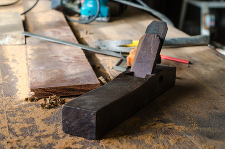 The carpenter was working furniture wood in studioの写真素材