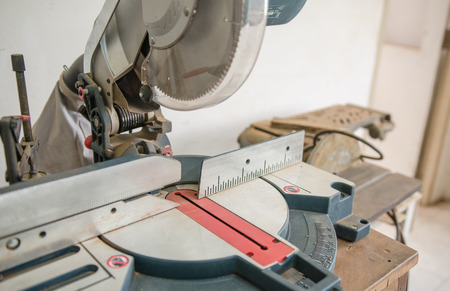 The carpenter was working furniture wood in studio