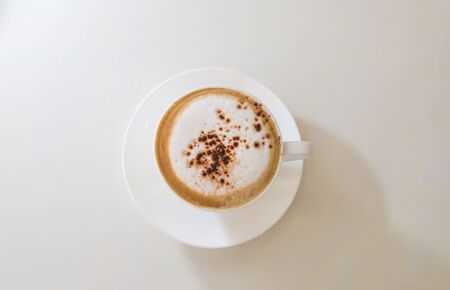 Fresh coffee on a table Whiteの写真素材