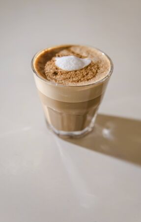 Fresh coffee on a table White