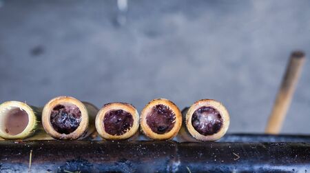 glutinous rice roasted in bamboo jointsの写真素材