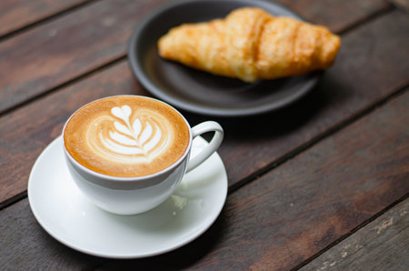Barista making a cup of coffee soft focus image .の写真素材