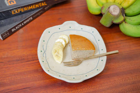 Banana cake on a wooden tableの写真素材