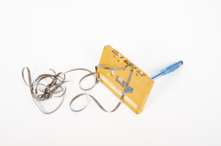 An old cassette tape on a white backgroundの写真素材