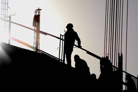 Construction workers in cut outの写真素材