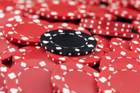 Casino chips, red and blackの写真素材