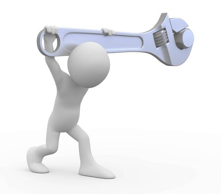 Man with a huge adjustable spanner tightening a nutの写真素材