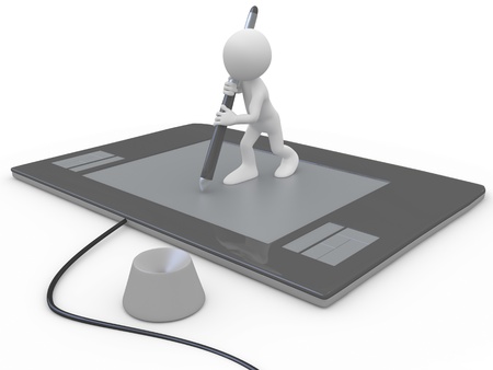 Man drawing on a huge graphics tabletの写真素材