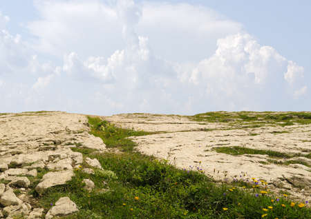 Desert landscape with clouds.の写真素材