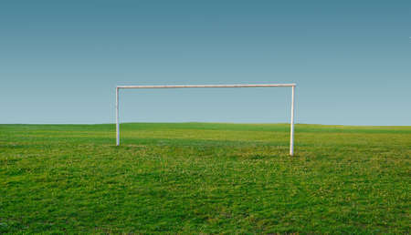 Football goal on a rural field.の写真素材