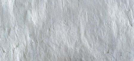 Background texture of painted plaster of the wall.の写真素材