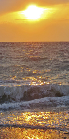 Beautiful sunset over the coast of the sea, the beach.の写真素材