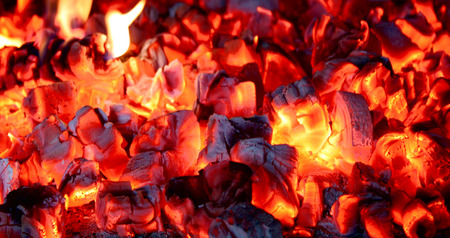 Background from a fire, conflagrant firewoods and coals.