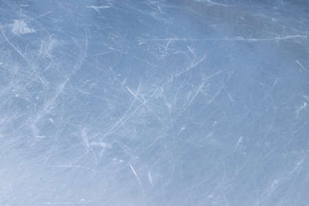 Ice rink background texture with scratches from skates.の写真素材