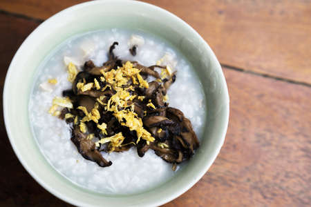 Boiled rice with mushroom & garlicの写真素材