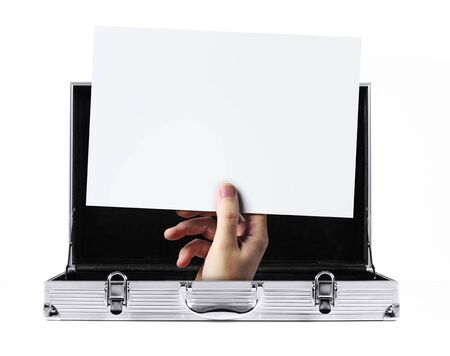 hand holding blank message appearing from metal briefcase