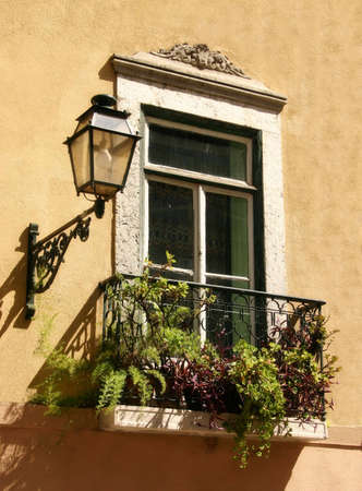 An old building: window and lamp