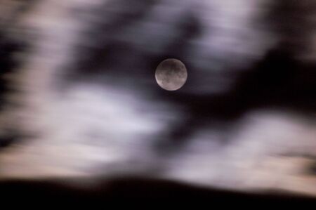 cloudy moonの写真素材