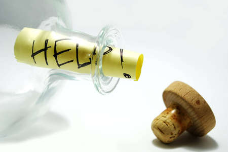 bottle with help messageの写真素材