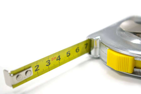 Tape measure isolated on white with shadows