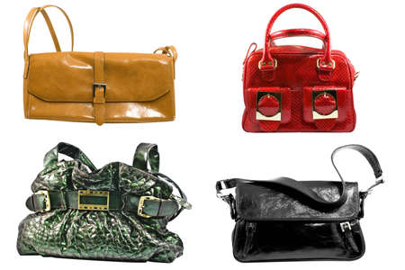 collection of four fashionable handbagsの写真素材