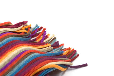 part of multi-colored scarf on white. may be used as backgroundの写真素材