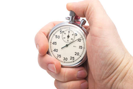 hand holding old mechanical stopwatch isolated on white