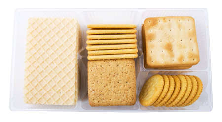 big pack of different crackers and cookies isolated on white backgroundの写真素材