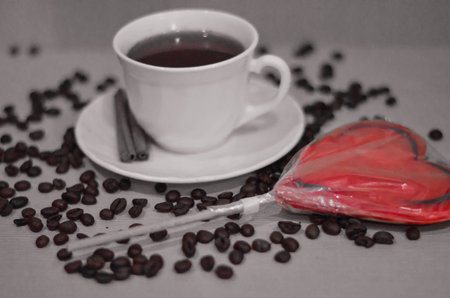 Still life with cup of tea and candyの写真素材