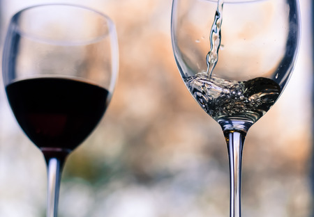 Still life with glass of wine isolatedの写真素材