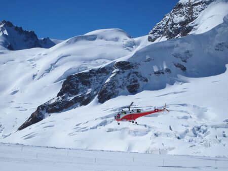 Vehicles helicopter at Jungfrau in Switzerland mountainの写真素材