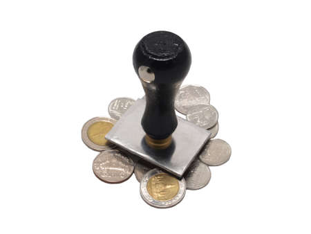 Rubber stamp with coins to show Finance Successの写真素材