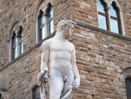 The Fountain of Neptune or Poseidon statue, made by Bartolomeo Ammannati in 1563ï¿½1565, is located in the Piazza della Signoria in front of the Palazzo Vecchio (Firenze, Italy).の写真素材