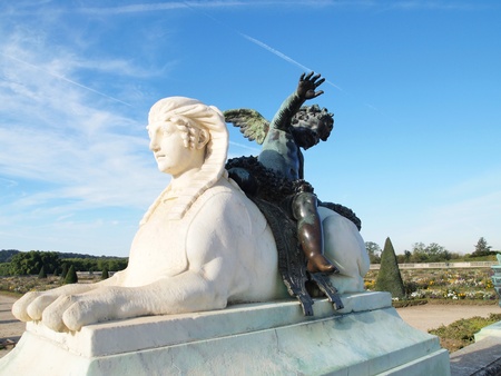 Sphinx and Cupid Statue at Versailles castle in France.の写真素材