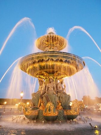 France, Paris: Fountain at the Place de la Concorde at night の写真素材