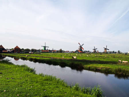 Dutch windmills of The Netherlands , that it's often the first fact people recall about the country.の写真素材