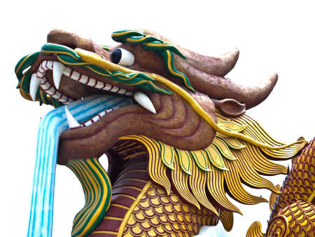 A Giant Crouching dragon at a Chinese style city pillar shrine in Suphan Buri Province  , Thailand (Isolated on white)の写真素材