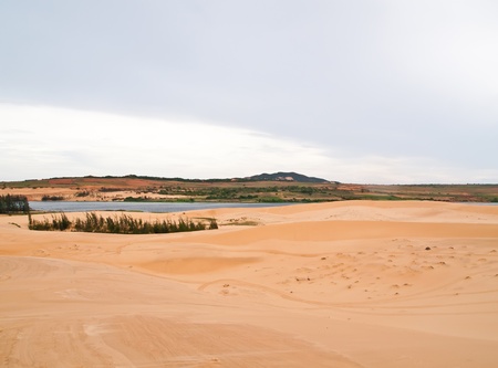 Lake in a white sand dune field near Mui Ne, Vietnam の写真素材