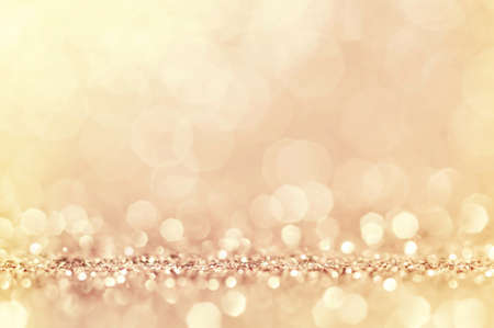 Pink gold, pink bokeh,circle abstract light background,Pink rose shining lights, sparkling glittering Valentines day,women day or event lights romantic backdrop.Blurred abstract holiday background.の写真素材
