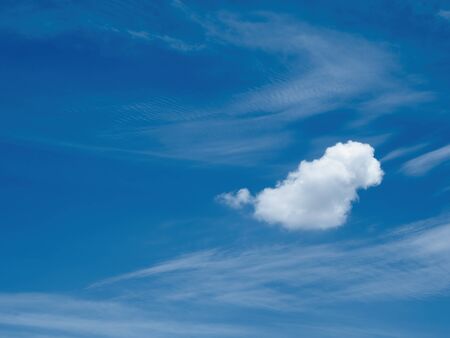 small clouds moved slowly by the wind. The beautiful sky with white clouds.の写真素材