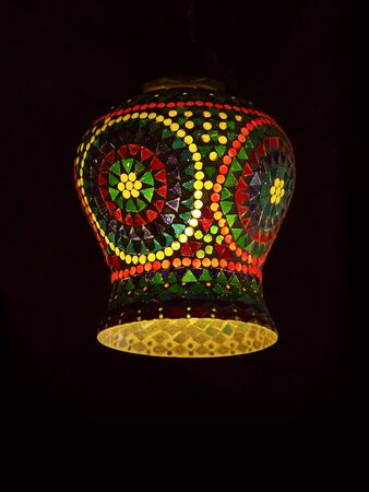 Intricate arabic lamp with lightsの写真素材