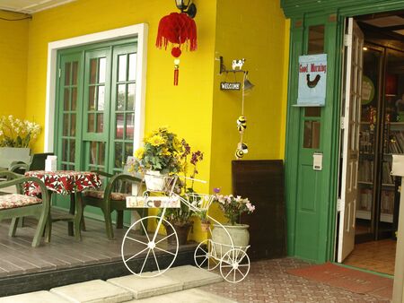 Flower pot shape bike at a coffee shop.の写真素材