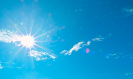 The beautiful sky with clouds and sun, real photoの写真素材