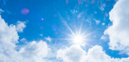 The new day is always bright. Bright blue day. Header for social media cropped for covers. horizontal photo banner for website header design. The beautiful sky with clouds and sun.  real photo.の写真素材