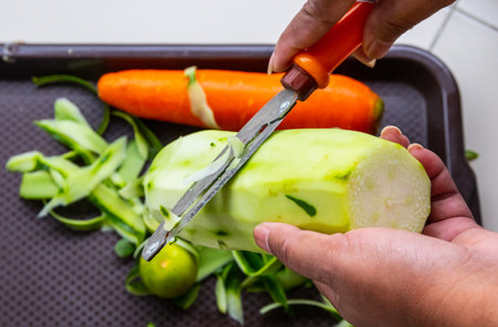 Cucumber peel as part of the preparation for later cookingの写真素材